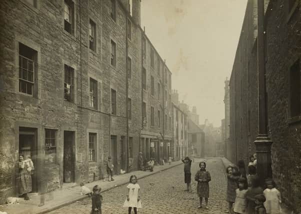 The residents of Cables Wynd in 1924. Picture: Edinburgh University Centre for Research Collections/Fraser Parkinson