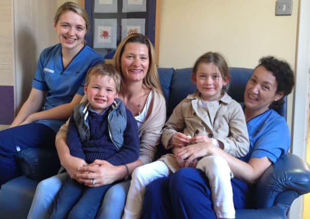 Staff nurse Hazel Forbes with Nikki Bremner, son Archie, daughter Olivia, and staff nurse Lisa Scally. Picture: Contribued