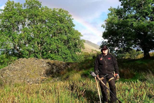 Derek McLennan at Arkinglas, the site where three early Bronze Age axe heads were discovered. PIC Tommy Baxter.