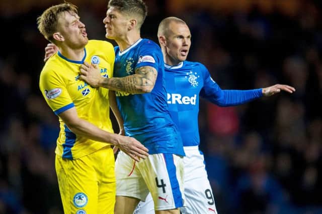 Rangers' Rob Kiernan confronts St Johnstone's Liam Craig with Kenny Millar in the background. Picture: Bill Murray/SNS