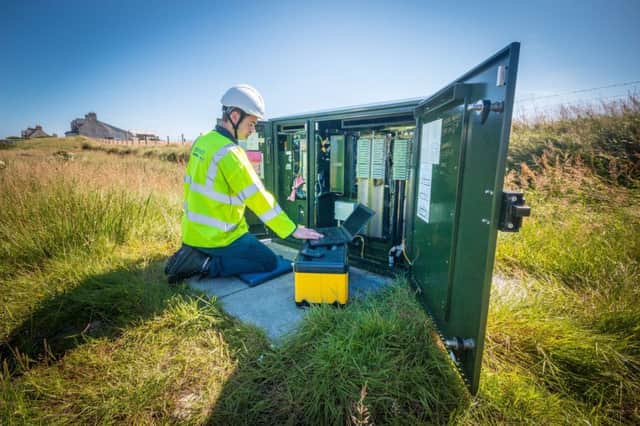 A BT broadband engineer at work in North Tolsta, a remote community on the eastern coast of the Isle of Lewis. Picture: Iain MacDonald/PA Wire