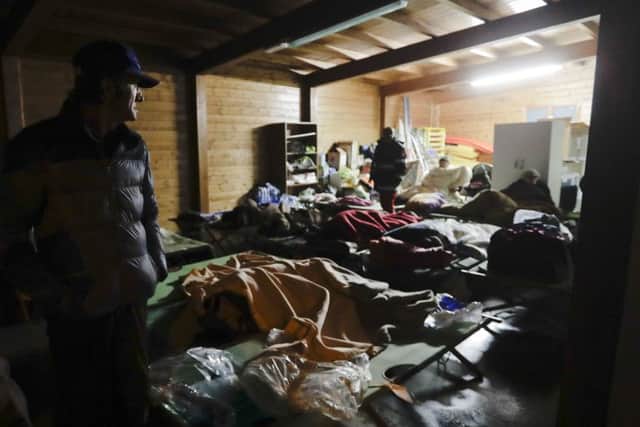Residents prepare to spend the night in makeshift shelters in the town of Visso in central Italy. (AP Photo/Alessandra Tarantino)