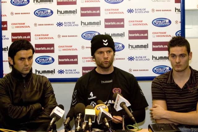 Steven Pressley flanked by Paul Hartley, left, and Craig Gordon. Picture: SNS