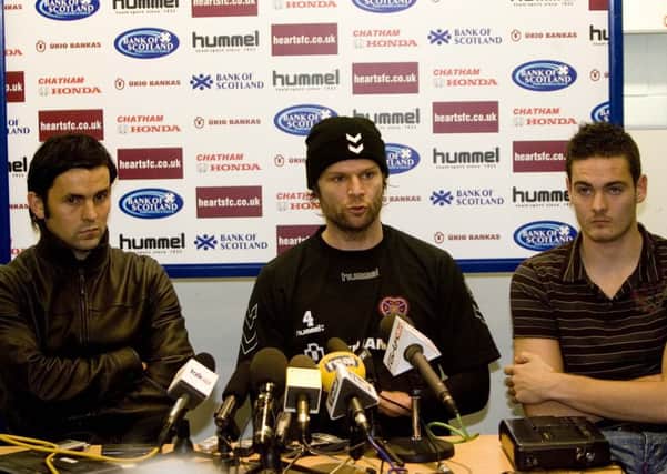 Steven Pressley flanked by Paul Hartley, left, and Craig Gordon. Picture: SNS