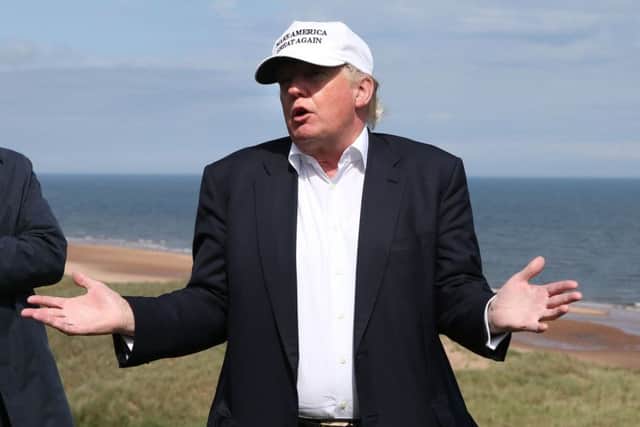 Donald Trump on the 14th tee of Trump International Golf Links at Balmedie. Picture: Andrew Milligan/PA Wire