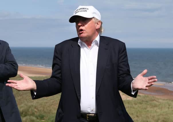 Donald Trump on the 14th tee of Trump International Golf Links at Balmedie. Picture: Andrew Milligan/PA Wire