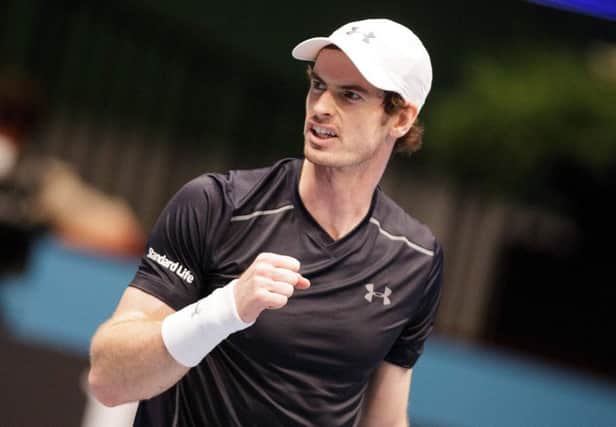 Andy Murray celebrates after battling back to defeat France's Gilles Simon in Vienna. Picture: AFP/Getty Images