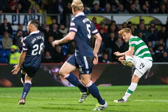 Stuart Armstrong fires Celtic two goals ahead against Ross County. Picture: PA
