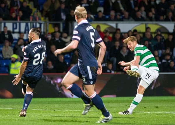 Stuart Armstrong fires Celtic two goals ahead against Ross County. Picture: PA