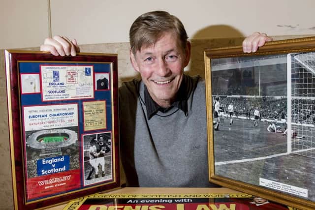 Jim McCalliog with mementoes of the 1967 victory, including a photograph of his winning goal on his Scotland debut. Picture: Craig Williamson/SNS