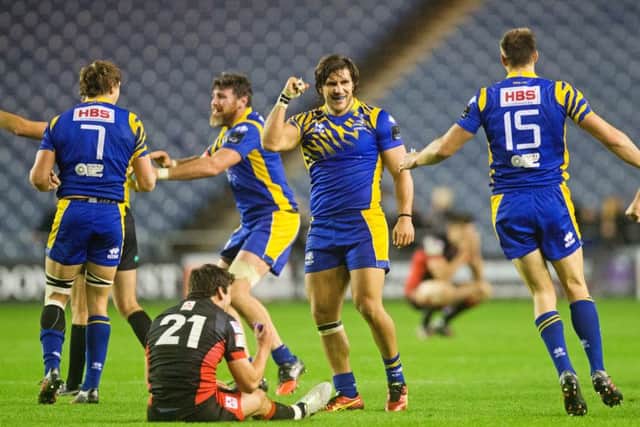 Zebre tryscorer Giovanbattista Venditti (centre) celebrates as Edinburgh's Sam Hidalgo-Clyne is left dejected. Picture: Graham Stuart/SNS/SRU