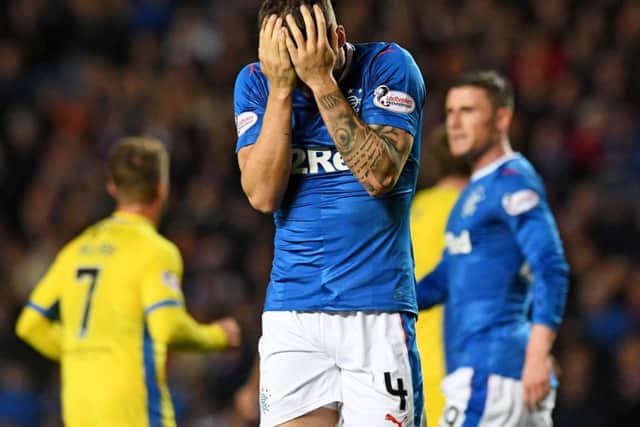 Rangers' Rob Kiernan cuts a dejected figure at Ibrox Picture: SNS