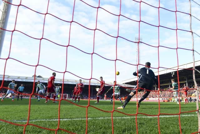Celtic's Tom Rogic scores the only goal of the match during the top-of-the-table clash versus Aberdeen. Picture: SNS/Rob Casey