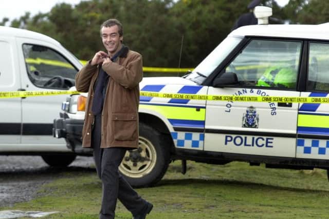 John Hannah, who first portrayed Rebus, seen during filming on Salisbury Crags in December 2000. Picture: TSPL