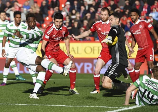 Celtic's Moussa Dembele sees his effort saved by the impressive Joe Lewis. Picture: Craig Williamson/SNS