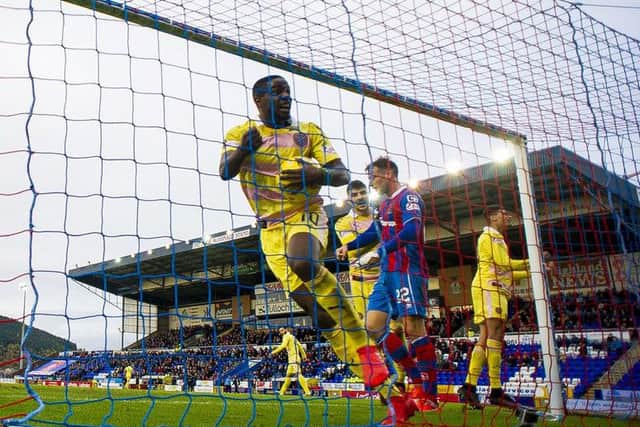 Hearts midfielder Arnaud Djoum celebrates his late equaliser against Inverness. Picture: Paul Devlin: SNS