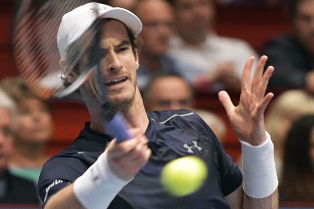 Andy Murray fires a return during his victory over Jo-Wilfried Tsonga. Picture: Getty.
