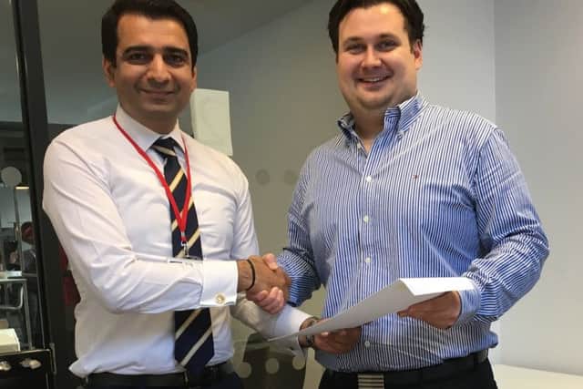Spectromax chief Bhuwan Kaushik, left, with new hire Lewis Johnston. Picture: Contributed