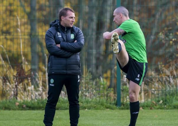 Celtic manager Brendan Rodgers and his captain Scott Brown in training ahead of the Champions League match in Monchengladbach. Picture: Craig Williamson/SNS