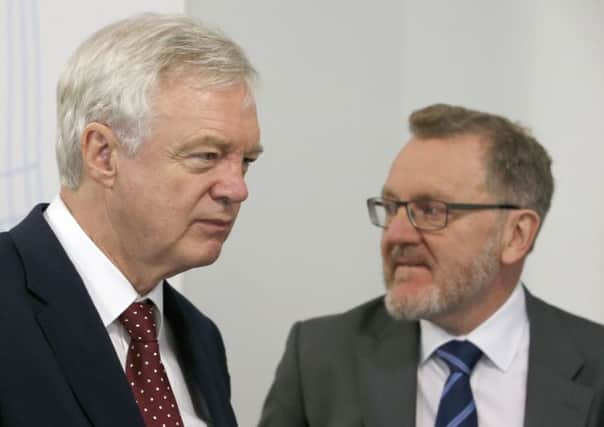 The SNP said it took 36 hours to get a response from David Davis - seen here with David Mundell - on the Brexit hotline
