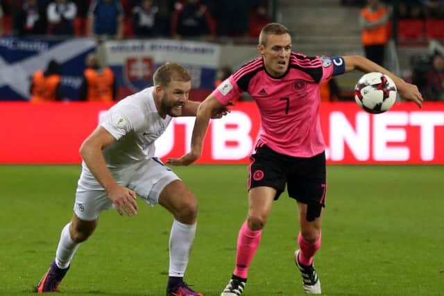 Slovakia's Adam Nemec (L) and Scotland's Darren Fletcher (R) vie for a ball during the WC 2018 football qualification match Picture: Getty Images