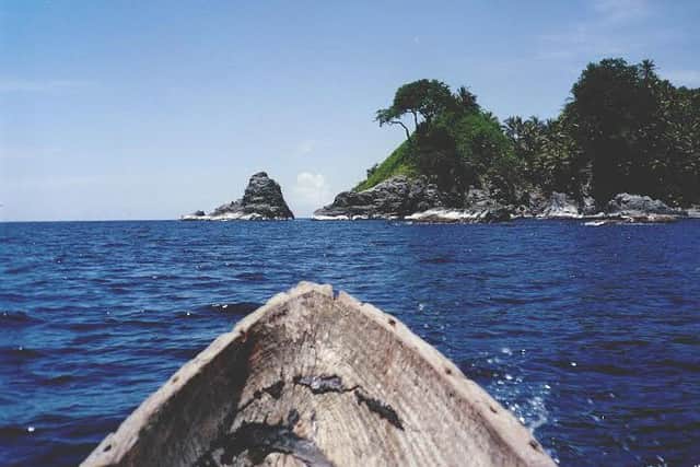 Approaching Punta Escoces -Scots Point - in a wooden dug-out canoe. PIC Copyright Stewart Redwood.