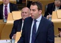 Maurice Golden has called for Scotland and England to be allowed to wear poppies.