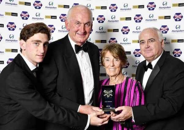 Former Rangers keeper Peter McCloy (second from left) was at Hampden with Daphne Wallace, John Wallace and John Wallace, widow, grandson and son of Jock Wallace, the former Rangers manager who was inducted into the Scottish Football Hall of Fame. Picture: Rob Casey/SNS