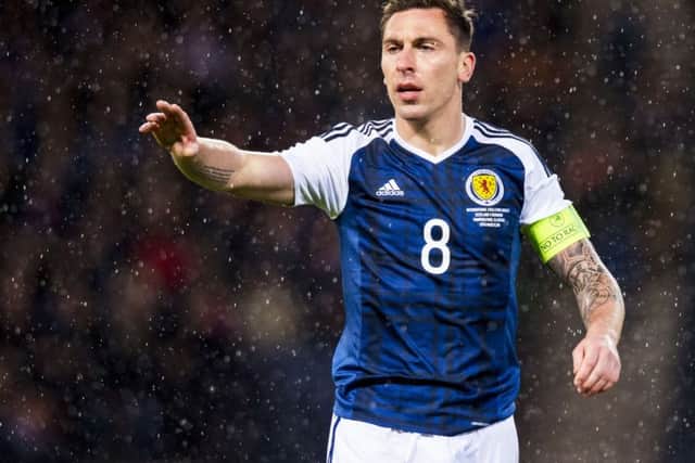 Scott Brown is a former Scotland captain but Darren Fletcher will retain the armband when Brown return for the England game at Wembley. Picture: Alan Harvey/SNS