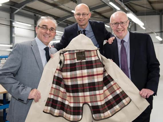 From left to right, Bill Burnett, finance manager at Mackintosh, Robert Stark, relationship manager at Clydesdale Bank and Willie Ross, production director at Mackintosh. Pic: Contributed