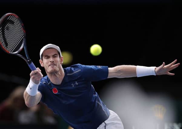 Britain's Andy Murray returns the ball to France's Lucas Pouille in Paris yesterday. Picture: Christophe Ena/AP