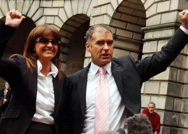 Tommy Sheridan leaves the Court of Session in Edinburgh with his wife, Gail. Picture: Danny Lawson/PA