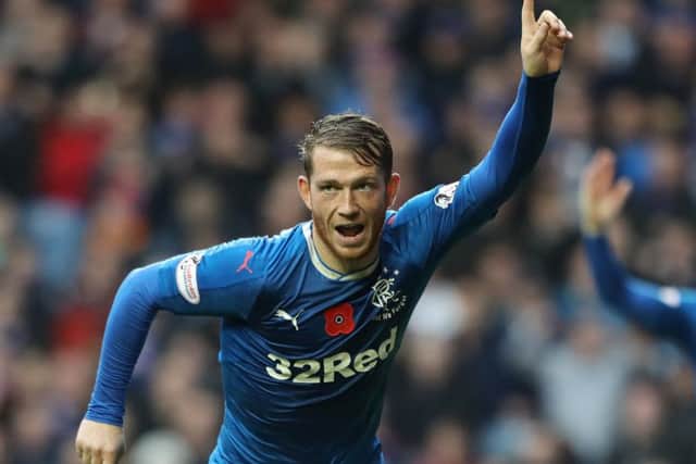 Joe Garner celebrates after scoring Rangers' third goal against Kilmarnock. Picture: Andrew Milligan/PA Wire