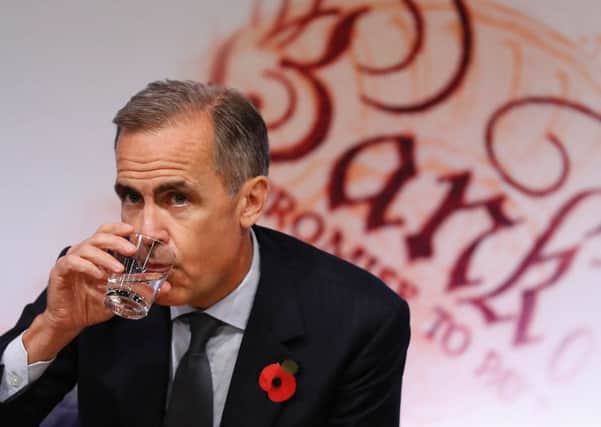 Governor Mark Carney delivers the Bank of England's quarterly inflation report. Picture: Kirsty Wigglesworth/AFP/Getty Images