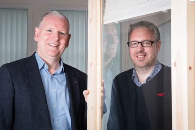 Talon chief Tom O'Hara, left, with Roxxap boss Mark Higgins. Picture: Contributed
