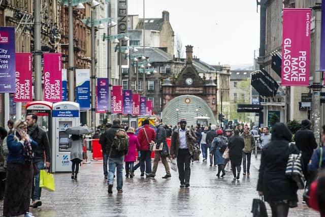 Shoppers in Glasgow are embracing Black Friday but their counterparts in Edinburgh are less keen. Picture: John Devlin
