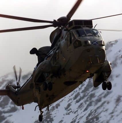 A RAF Search and Rescue Helicopter on a training exercise with Glencoe Mountain Rescue Team in 2001. PIC MoD.