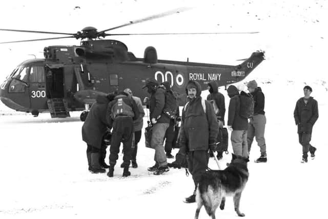 Rescue teams with Royal Navy helicopter and search dog in The Cairngorms, looking for pupils from Ainslie Park School in Edinburgh in November 1971. Five teenagers and their instructor died. PIC TSPL