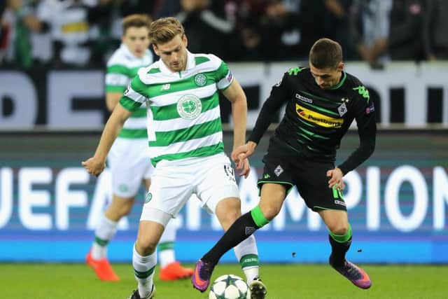 Stuart Armstrong, flourishing in his new central role at Celtic, jostles for possession with Thorgan Hazard of Borussia Monchengladbach. Picture: Simon Hofmann/Bongarts/Getty Images