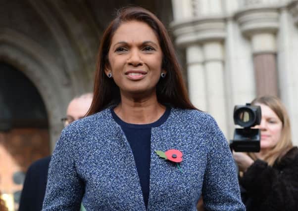 Gina Miller, the lead claimant in the case, speaks to the media at the High Court in London. Picture: Dominic Lipinski/PA