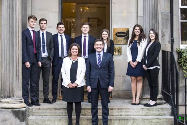 Balmoral founder Stuart MacDonald with Debra Tracy of Direct Partners and the wealth manager's new recruits. Picture: Contributed