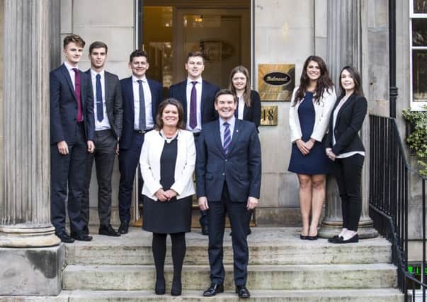 Balmoral founder Stuart MacDonald with Debra Tracy of Direct Partners and the wealth manager's new recruits. Picture: Contributed