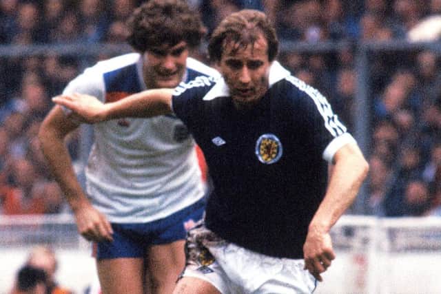 Asa Hartford leaves Glenn Hoddle trailing during Scotland's 1-0 win over England at Wembley in 1981. Picture: SNS Group
