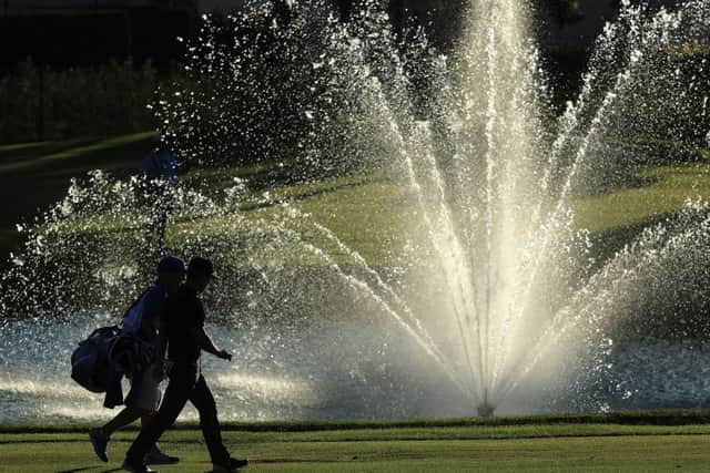 ANTALYA, TURKEY - NOVEMBER 04: Thorbjorn Olesen of Denmark walks down the 18th hole with his caddie Dominic Bott during day two of the Turkish Airlines Open at the Regnum Carya Golf & Spa Resort on November 4, 2016 in Antalya, Turkey. (Photo by Richard Heathcote/Getty Images)