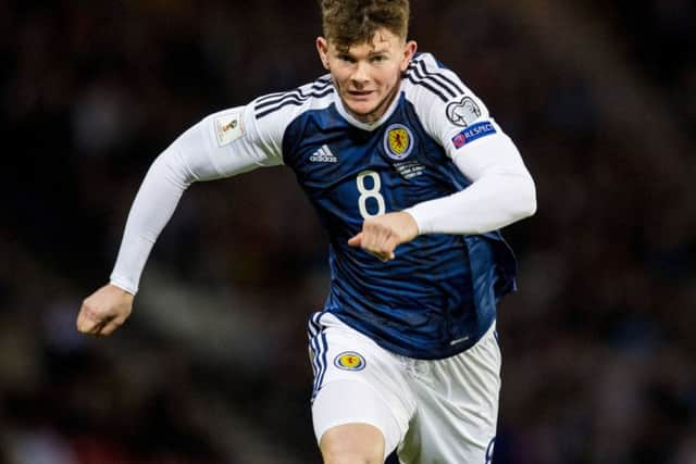 Going forward: Oli  Burke is playing in Europe by moving there. Most members of the national squad lack such competition .
Picture: Alan Harvey/SNS