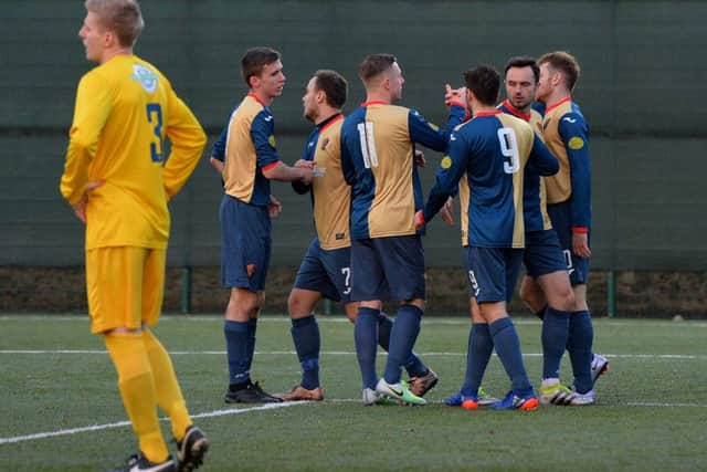 East Kilbride celebrate Ross McNeil's goal, their second of the match, during their 3-1 win over BSC Glasgow. Picture: Getty/Mark Runnacles