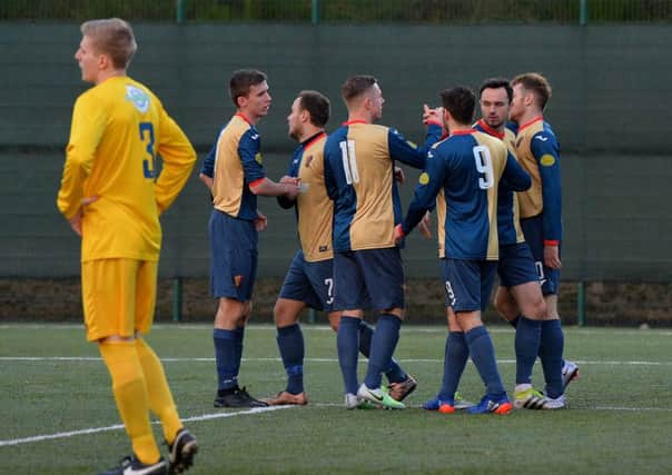 East Kilbride celebrate Ross McNeil's goal, their second of the match, during their 3-1 win over BSC Glasgow. Picture: Getty/Mark Runnacles