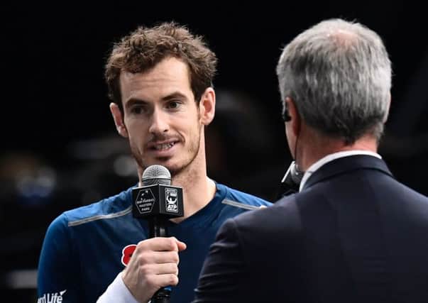 Andy Murray speaks on court after being confirmed as the new world number one. Picture: AFP/Getty Images