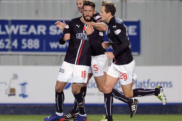 Falkirk celebrate Lee Miller's late equaliser. Picture: Michael Gillen