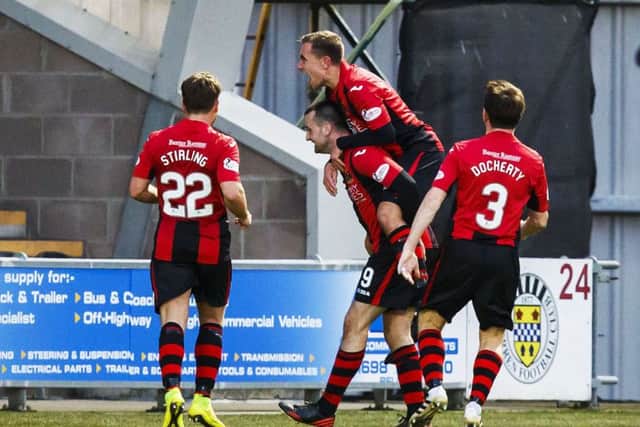 Dumbarton's Garry Fleming (9) celebrates after he scores his side's goal. Picture: Roddy Scott/SNS